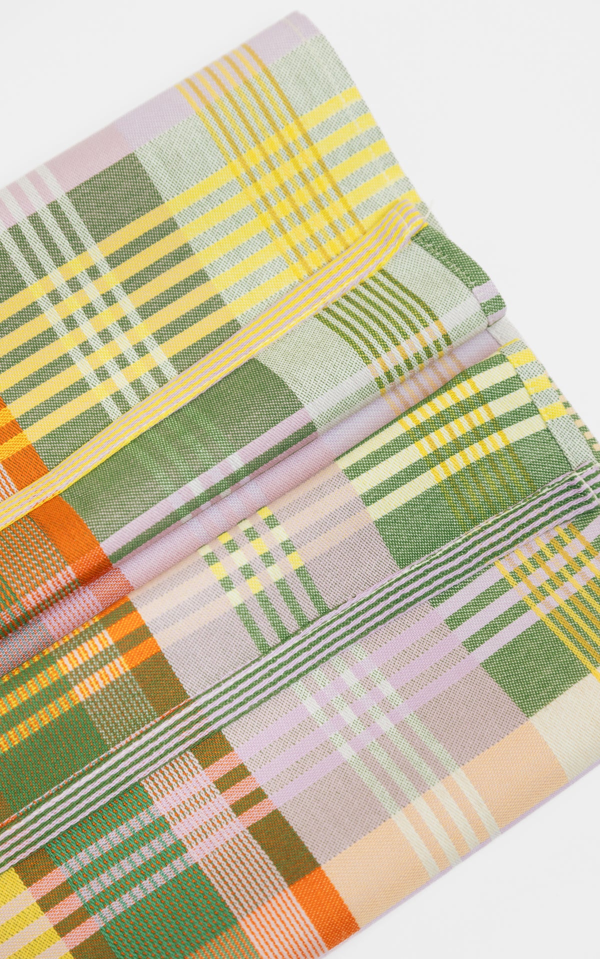 Viskestykke med mønster i grøn, gul og orange · Lavet af garnrester fra tekstilindustrien · Designer af Foekje Fleur hos Niedziella & Friends
