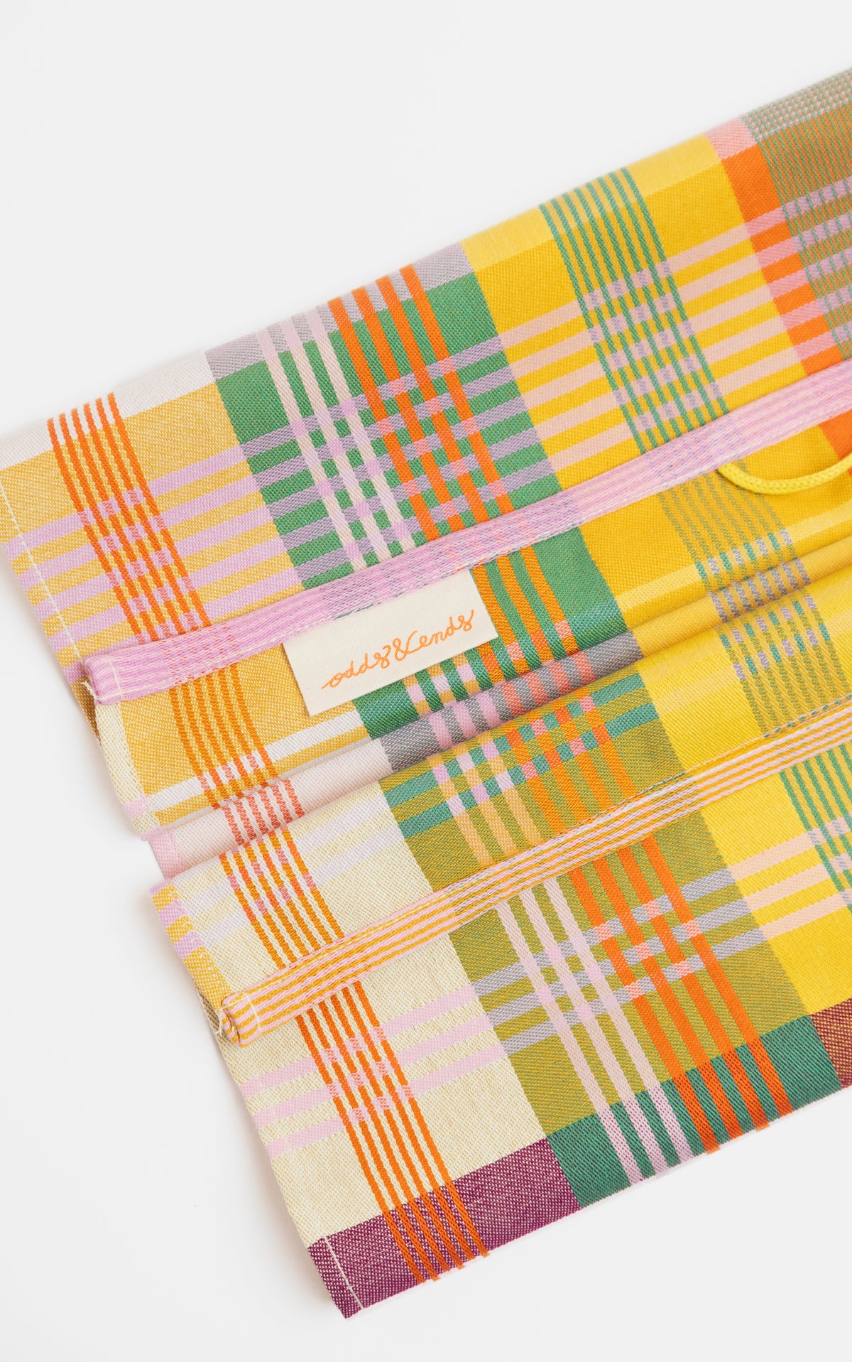 Viskestykke med mønster i rød, orange, gul og lyserød · Lavet af garnrester fra tekstilindustrien · Designer af Foekje Fleur hos Niedziella & Friends